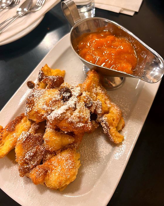 The Kaiserschmarrn, a shredded sweet pancake, with compote on the side